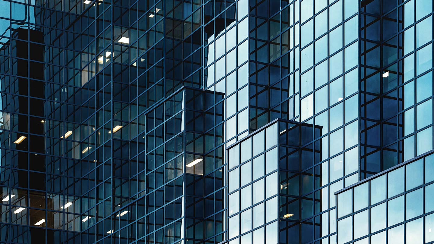 tall buildings with glass windows